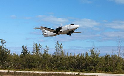 Beachcraft 1900 taking off from airport in Long Island in The Bahamas