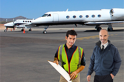 Private jets parked on the ramp with CST flight services agent assisting pilot